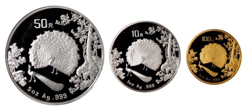 1993年孔雀开屏一盎司金、银币各一枚；五盎司银币一枚（无图）