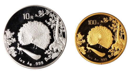 1993年孔雀开屏一盎司金、银币各一枚（无图）