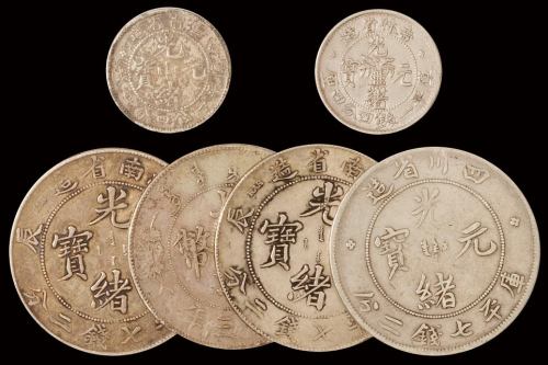 清代银币一组六枚：江南甲辰七钱二分银币二枚；四川省造光绪元宝七钱二分“大头龙”版银币一枚；宣统三年大清银币壹圆一枚；吉林无纪年一钱四分四厘、云南省造光绪元宝一钱四分四厘银币各一枚，极美品