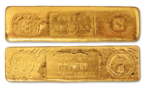 香港“新鸿基金业公司 金银业贸易场 九九伍两”金条一枚，重量：187.1克，背铸“万宝源流”金钱图案，品种少见，品相极佳
