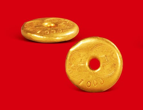 “广州光明足金”一两金饼