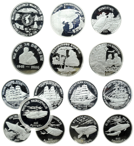2001年朝鲜铝质精铸币15枚一组，面值1圜，题材包括鲸鱼，船及其他，UNC品相，附原包装