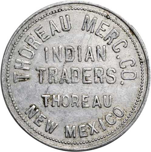 New Mexico--Thoreau. Undated Thoreau Merchant Co. Indian Traders. $1.00. Aluminum. 35 mm. EF-40.