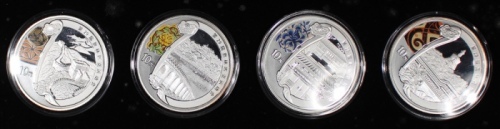 2008年中国北京奥运10元纪念银币4枚一套，各重1安士，均UNC，附原盒及证书，#133560, #133552, #132345及#125009，发行160000枚