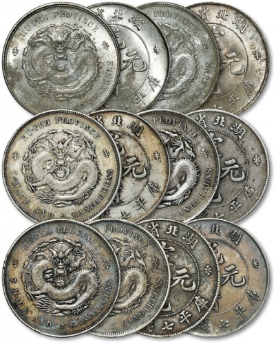  清湖北省造光绪元宝、宣统元宝库平七钱二分银币各三枚，共计六枚，打制规范，整体清晰，酱彩、灰色包浆及原色银光，状态自然，极美至近未使用品