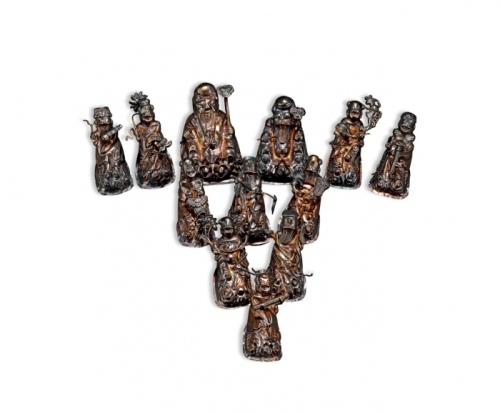  清民上海“凤宝”、“杨庆和久记”、“宝康福”银楼制寿星及八仙鎏金银帽花共12枚，工艺精美，形象生动，沪上藏家出品，保存完好