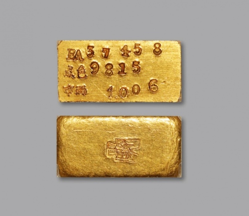  1946-49中央造币厂“布图”一两金条一枚，重：31.5g，编号：BA37458，成色：981.5，市两：1.006，图案清晰完整，色泽纯正，完全未使用品，金盾PCGS MS63（86651597）