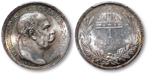  奥匈·匈牙利1915年皇帝“弗朗茨约瑟夫一世像”1科罗纳银币一枚，打制规范深峻，浮雕感强烈，细节分明，五彩包浆，底光丝滑柔亮，状态一流，品相顶级，金盾PCGS MS66（80967229）为此公司此品
