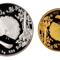 1993年孔雀开屏一盎司金、银币各一枚（无图）