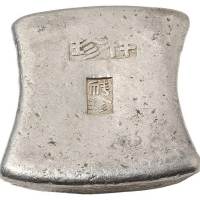 清代广西“祥珍”、“祥珍”十两砝码锭一枚，侧打“过火为真”戳记，重量384.8克，成色颇佳
