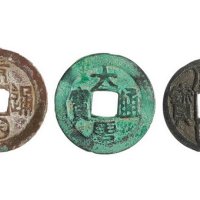 五代十国“唐国通宝”背巨星大样、“大唐通宝”阔缘各一枚