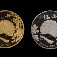 1993年孔雀开屏1盎司金、银币各一枚（无图）