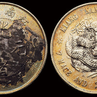 1899年己亥江南省造光绪元宝库平七钱二分银币一枚，老龙版，两面均盖有钱庄墨戳，品相颇佳，近未使用品