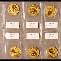 2002年熊猫纪念金币十枚，均为普制，面值200元，重量1/2盎司，成色99.9%，发行量75000，带造币厂原封套，保存极好