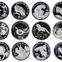 1988-1997年十二生肖一盎司加厚银币一套十二枚，均含纯银1盎司，成色99.9%，面值10元，均附证书