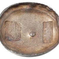 清代四川“昭通府 足色纹银”双戳十两圆锭一枚，重量：363.7克，锭面基本完好，品相尤佳