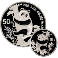 1987年熊猫纪念银币二枚，均精制，其中一枚面值50元，重量5盎司，另一枚面值10元，重量1盎司，成色均为99.9%，附原盒及证书