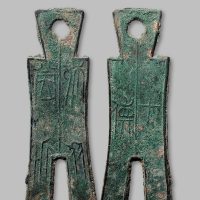 “桡比当釿”背“七傎”