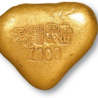 “佛山西成老铺纯净足金”一两金饼