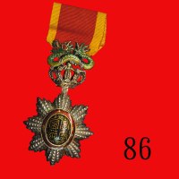 法属安南大南朝龙星银质镶珐琅勳章，带绶带。云南都督唐继尧曾获颁同类勳章。极美品French Vietnam, Silver Enamel Dragon & Star Medal, with ribbo