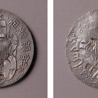 台湾道光年铸足纹银饼一枚