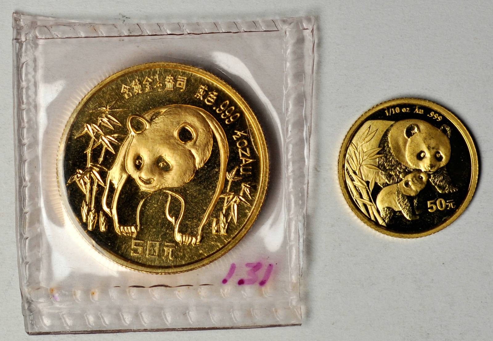 1986年熊猫纪念金币1/2盎司等一组2枚 完未流通