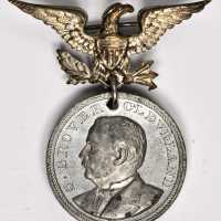 Pair of nice quality 1884 Grover Cleveland medalets.