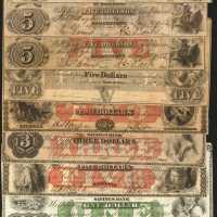 Lot of (12) Maryland Obsolete Notes. Fine to Choice Uncirculated.