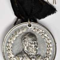 Pair of 1880 James A. Garfield medalets.