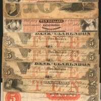 Lot of (12) Obsolete Banknotes from North Carolina. Fine to Choice Uncirculated.