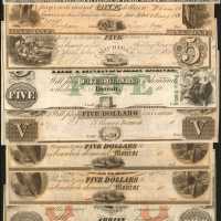 Lot of (12) Obsolete Banknotes from Michigan. Very Fine to Choice Uncirculated.