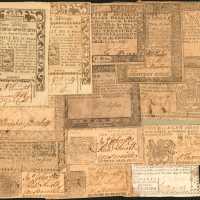Colonial Currency. Collection of (14) Notes from Various Colonies. Very Good to About Uncirculated.