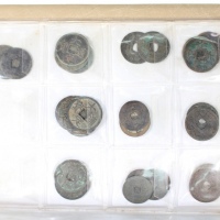  辽代、西夏、金朝、蒙古及元朝古钱一组74枚，包括保寧通宝，咸雍通宝，天庆元宝等，混合品相，若干為参考币，建议预览，原况出售概不退换，稀见且有趣的一组