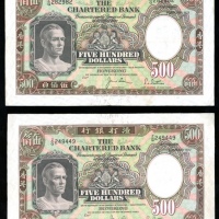  1977年渣打银行500元一对，Z/Q字轨，GVF品相，曾压纸 Chartered Bank, Hong Kong, $500 (2), 1 January 1977, prefixes Z/Q, (