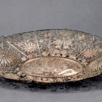  民国“成都·丽生·公记·纹银”掐丝镂空银盘一只，重：138g，工艺精湛，图案繁复精美，原味醇厚包浆，保存完好<br>编者按：成都丽生银楼创立于光绪十八年（1892年），地址在成都暑袜北街40号，老板姓