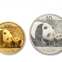  2011年熊猫普制一盎司金币、一盎司银币各一枚
