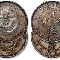  清光绪34年北洋造光绪元宝库平七钱二分银币一枚、湖北省造宣统元宝库平七钱二分银币一枚，共计二枚，整体清晰，灰色包浆，银光亮泽，分别为NGC XF Detail、AU Detail（6338440-00