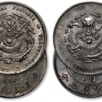  清江南省造“甲辰”、“庚子”光绪元宝库平七钱二分银币共二枚，其中“甲辰”为7前带.版，打制规范，整体清晰，银光亮泽，均为金盾PCGS XF Detail（87144331、80786859）