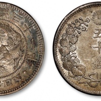  日本明治三十一年五十钱银币一枚，打制深峻规范，图案挺拔饱满，底版平整，深灰色包浆，底光丝滑闪亮，状态上佳，完全未使用品