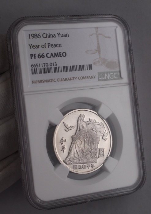  1986年国际和平年纪念壹圆肥鸽精制 NGC PF 66