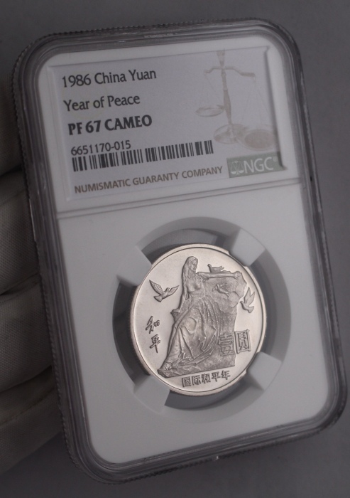  1986年国际和平年纪念壹圆肥鸽精制 NGC PF 67